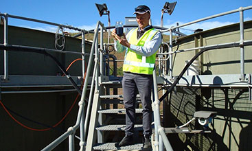 Image of an inspector at a water treatment plant